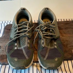 On running shoes size 8 light olive green.